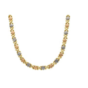 18-inch tricolor Stampato chain in 14K yellow, rose, and white gold, 7.3mm width.