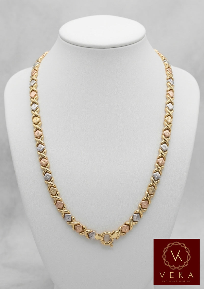18-inch tricolor Stampato chain in 14K yellow, rose, and white gold, 7.3mm width on a white neck display,