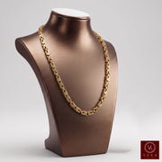 A Veka Jewelry 14k solid gold Byzantine link chain necklace displayed on a professional brown jewelry bust against a neutral background.