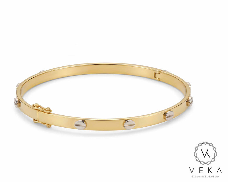 14K yellow gold 4mm screw motif hollow bangle bracelet with secure box clasp on pure white background, Veka Jewelry Orlando FL.