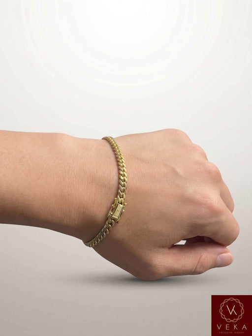 veka-jewelry-14k-yellow-gold-5mm-cuban-link-bracelet-on-wrist
