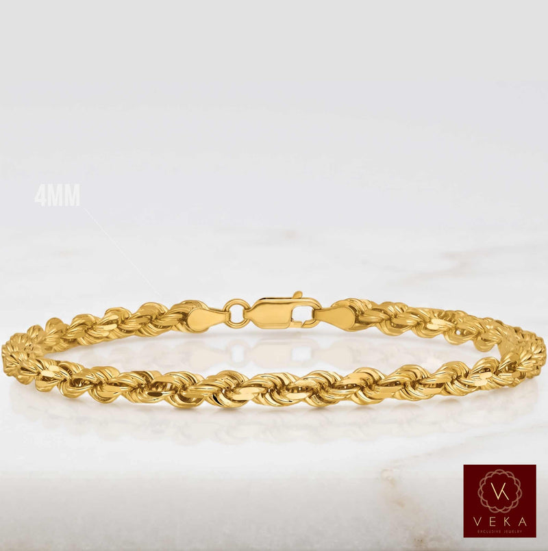 A 14k Yellow 4mm yellow gold rope link bracelet displayed on a white quartz surface. The image features a Veka brand logo in the bottom right corner and a '4MM' size text overlay on the left.