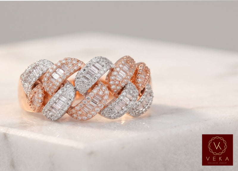 Professional studio shot of a VEKA Exclusive Jewelry Cuban link ring with baguette and round diamonds on a marble surface