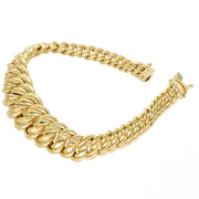 High-angle shot of a women's 10K yellow gold tapered princess link bracelet highlighting the high-polish finish