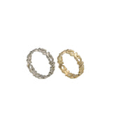 Front view of two 14k solid gold hugs and kisses XOXO bands on a white background