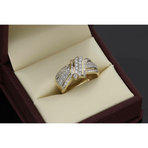 14 Karat Gold 0.75 CTW Baguette & Round Diamond