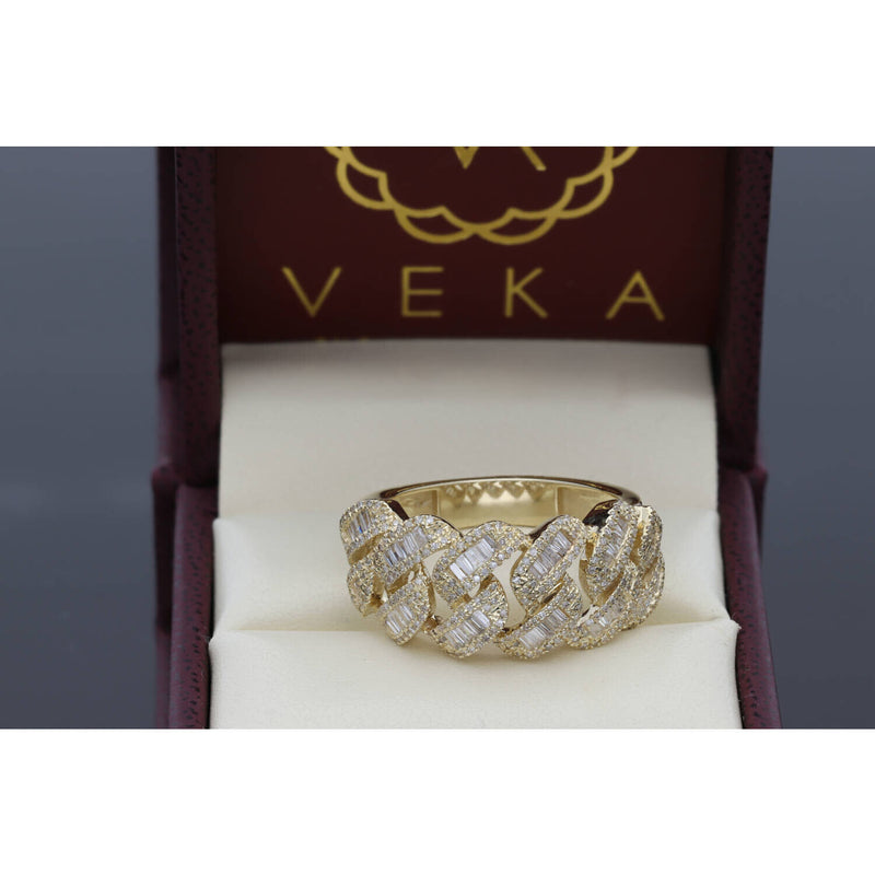 Detailed view of the inside of a gold and diamond link ring presented in a premium burgundy Veka Jewelry gift box with a cream velvet interior.
