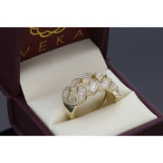 Detailed view of a gold and diamond link ring presented in a premium burgundy Veka Jewelry gift box with a cream velvet interior.