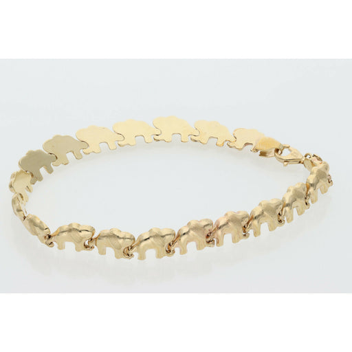 A high-quality 10K yellow gold elephant stampato bracelet with 8mm wide links and a lobster clasp displayed on a professional white jewelry tray.