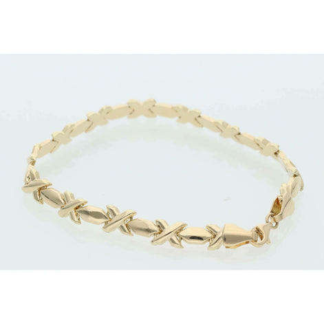 Professional product shot of a 7-inch yellow gold XOXO Hugs & Kisses bracelet on a clean white background