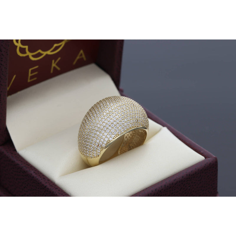 Close-up view of 14K gold pavé dome ring showing sparkling cubic zirconia stones and premium craftsmanship