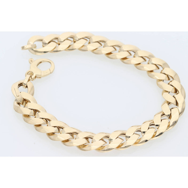 14K Gold chain Cuban Link bracelet on a light gray background