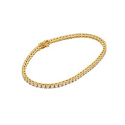 7-inch round diamond tennis bracelet in 14K yellow gold featuring VVS natural diamonds