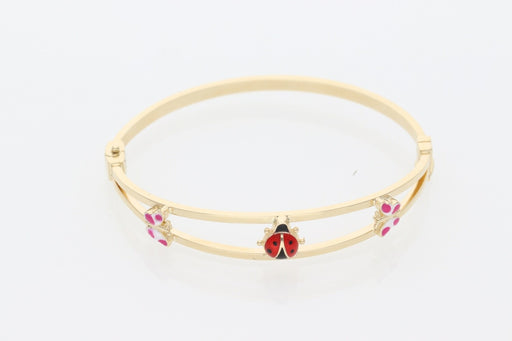 A 14K Real Gold bangle with ladybug charm  and two butterfly small charms on