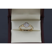 Real and subtle Clover Ring with Stone on top and beaded all around.