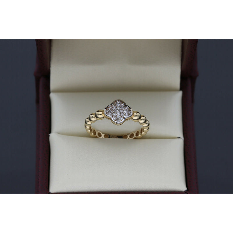 Real and subtle Clover Ring with Stone on top and beaded all around.