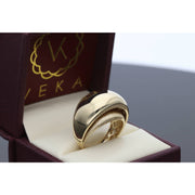 Close-up detail of 14K gold double oval ring displaying premium craftsmanship with matte and polished gold surfaces and CZ accents