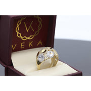 Real Gold with Orbits on a rounded face all around combining white and yellow and each one adorned with stones all around