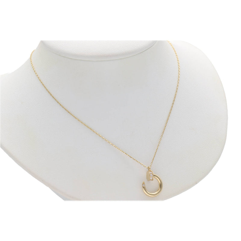 Rolo style necklace with Nail Pendant in 14 Karat Solid Gold displayed in a side view.