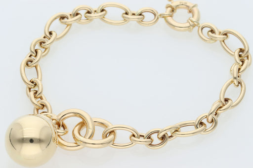 14K Yellow Gold 6mm Oval Rolo Link Bracelet featuring a large sphere charm and secure round spring lock clasp on a white background.