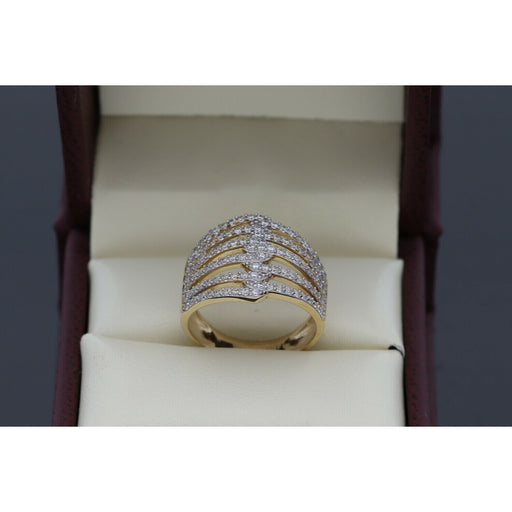 14 Karat Gold Radiant Zircon Cascade Ring  on a ring box of clear leather.