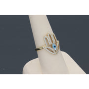 14 Karat Gold Hamsa hand ring on a finger display
