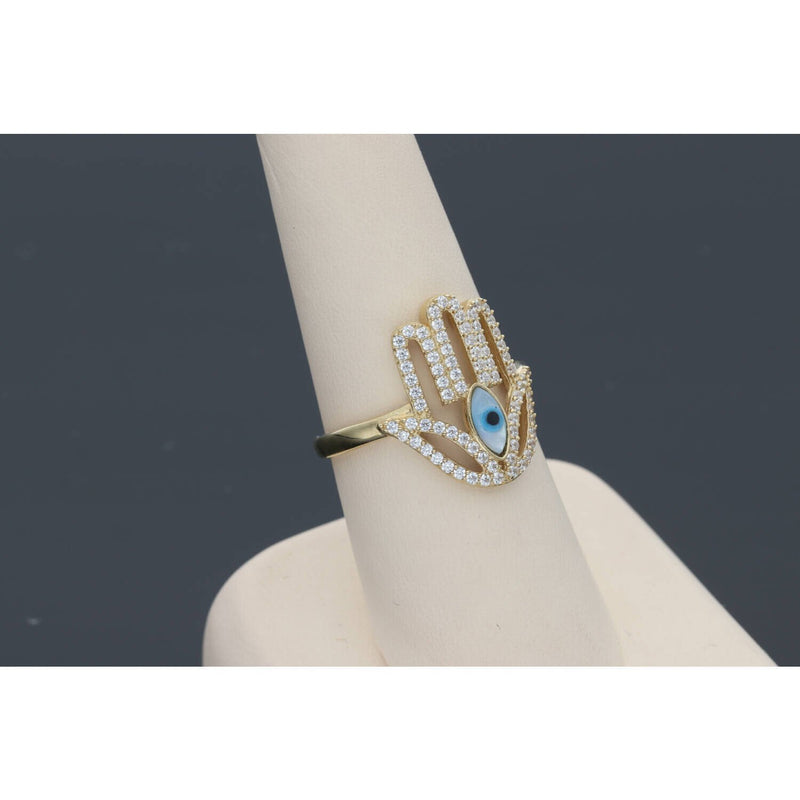 14 Karat Gold Hamsa hand ring on a finger display