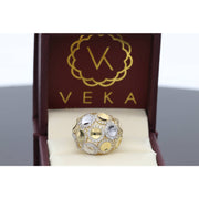 Real Gold 10 Karat with circles that bring the name Orbit. Its circular gem design and luxurious gold finish. SHOP AT VEKA JEWELRY