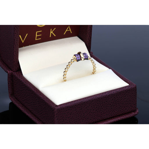 14K yellow gold thin bead band ring with purple zircon stones displayed in luxury VEKA jewelry box - delicate stackable ring