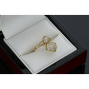 10K gold spinner ring with circle and heart charms featuring zirconium stones in white jewelry box"