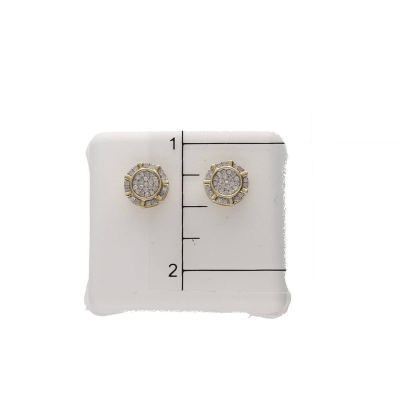 Product size reference showing a pair of Veka Jewelry men's 10K gold diamond stud earrings measuring exactly 9mm in diameter against a metric scale ruler 1 inch