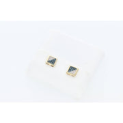 An extreme macro photograph showing the precise setting of the central square black diamond and surrounding halo on a single Veka Jewelry earring.