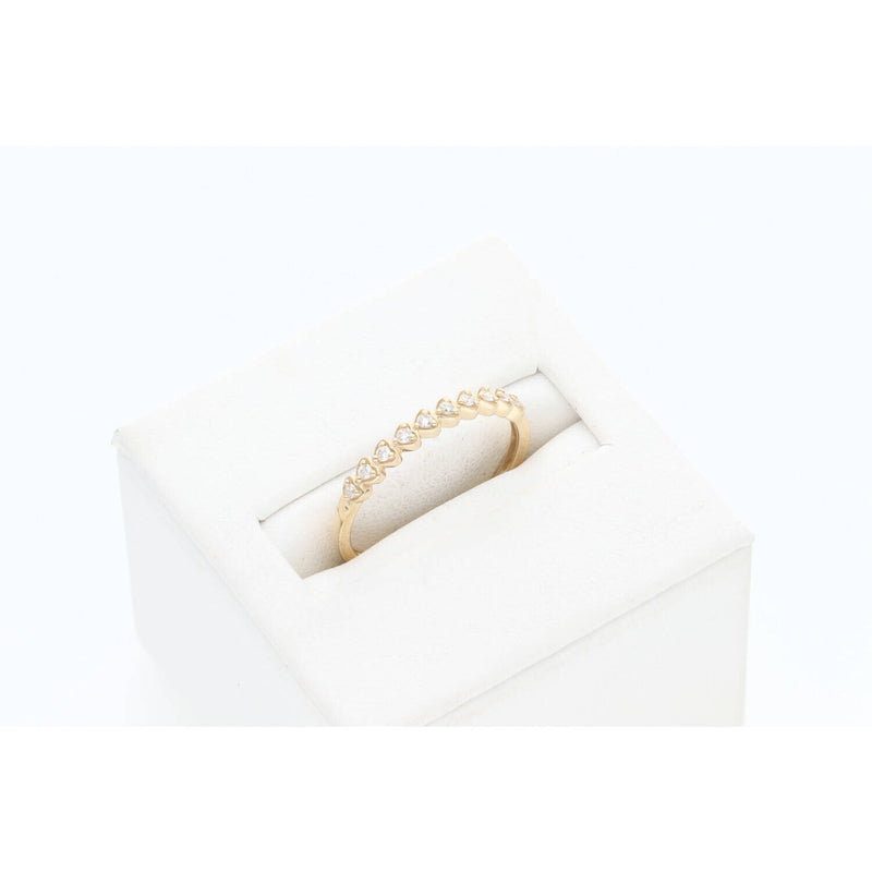 op view of Veka Jewelry 1/10 ctw natural diamond heart band in a white luxury ring box.