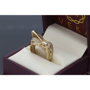 The 10k yellow gold CZ filigree ring presented inside a luxury burgundy VEKA Jewelry gift box with cream interior.