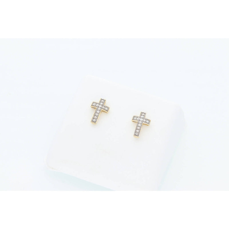 High-resolution studio shot of two 10 karat gold religious cross earrings with brilliant 0.10 CTW natural diamond accents on a clean white display cushion.